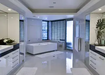 Shearwater Residence: Example of monochrome finishes and a very practical layout for a his ‘n’ hers ensuite
