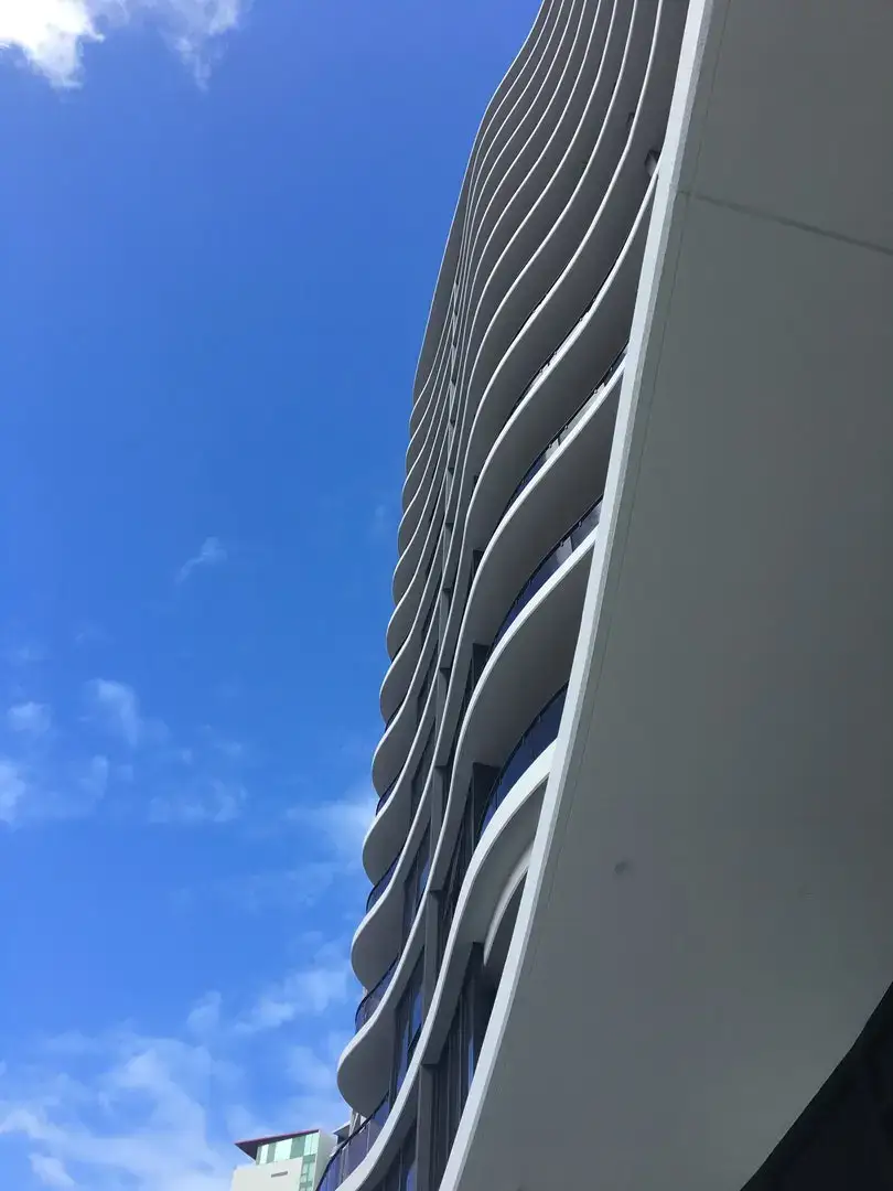 HHH Architects celebrate the Master Builders Queensland Housing and Construction Award for Allegra Apartments